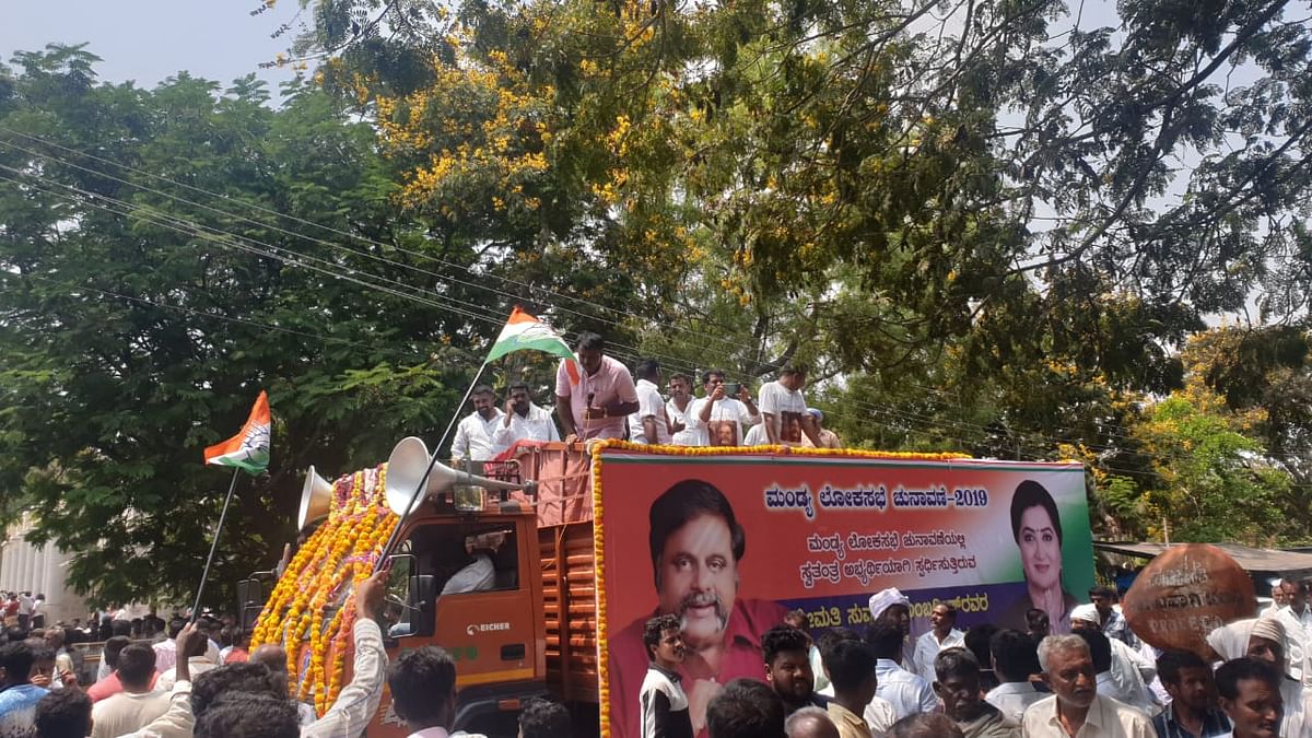 Sumalatha, wife of Ambareesh, filed her independent nomination from Mandya amid a rally waving Congress flags
