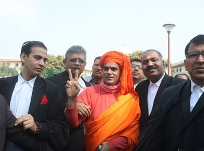 New Delhi: All India Hindu Mahasabha leader Swami Chakrapani Maharaj talks to media persons at Supreme Court in New Delhi on March 8, 2019. The Supreme Court on Friday ordered mediation to settle the Ram Janmabhoomi-Babri Masjid Ayodhya title dispute case by a three-member panel. (Photo: IANS)