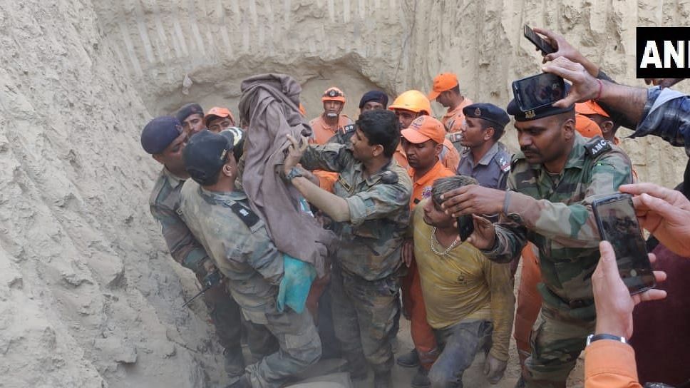 A team rescues 18-month-old Nadim who fell into a borewell in Hisar district of Haryana.