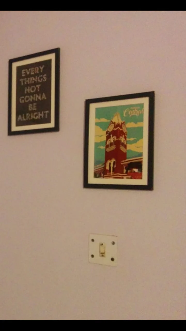 The poster of the railway station hanging on the wall in my current residence.