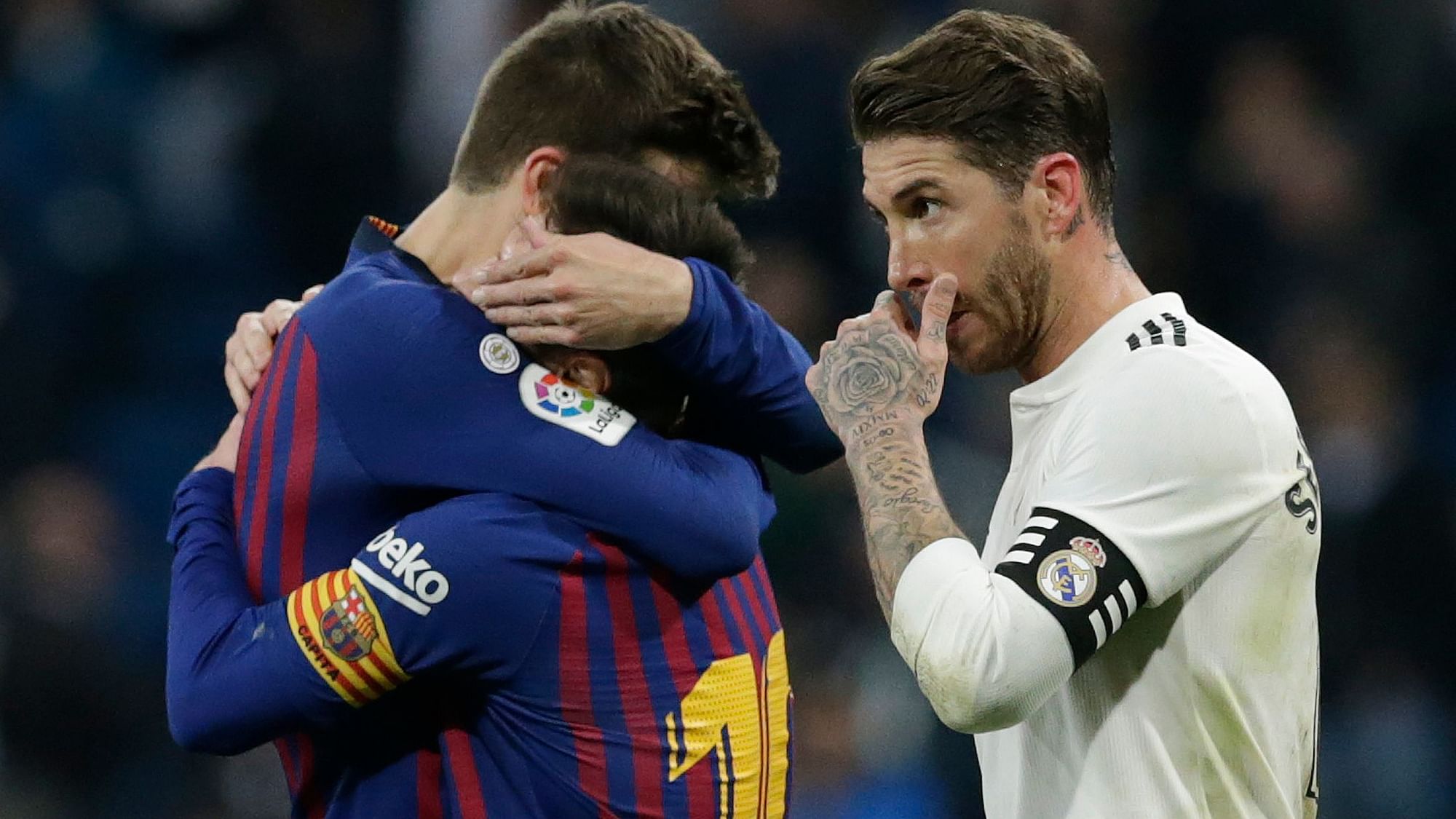 Captain Sergio Ramos (right) cuts a dejected figure after Real Madrid fell to a 1-0 loss to arch-rivals Barcelona in their La Liga clash on Saturday, 2 March.