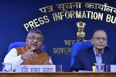 New Delhi: Union Law and Justice Minister Ravi Shankar Prasad along with Union Finance and Corporate Affairs Minister Arun Jaitley addresses a press conference in New Delhi, on March 7, 2019. (Photo: IANS)