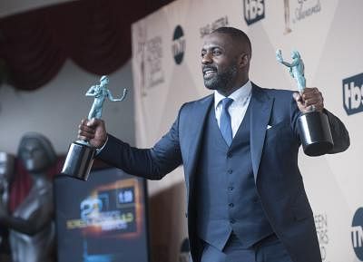 LOS ANGELES, Jan. 31, 2016 (Xinhua) -- Actor Idris Elba wins the Outstanding Performance by a Male Actor in a Supporting Role and the Outstanding Performance by a Male Actor in a Television Movie or Miniseries at the 22nd Screen Actors Guild Awards at the Shrine Auditorium, in Los Angeles, the United States, on Jan. 30, 2016. (Xinhua/Yang Lei/IANS)