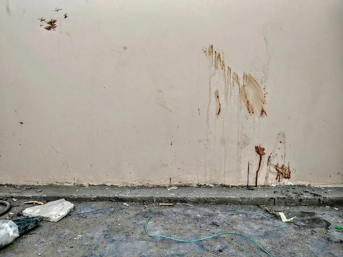 Blood stains the floor and the walls of the balcony where the mob attacked the Muslim men on 21 March, 2019.