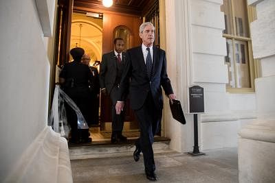WASHINGTON, June 21, 2017 (Xinhua) -- Former FBI Director Robert Mueller (front), the special counsel probing Russian interference in the 2016 U.S. election, leaves the Capitol building after meeting with the Senate Judiciary Committee on Capitol Hill in Washington D.C., the United States, on June 21, 2017. (Xinhua/Ting Shen/IANS)