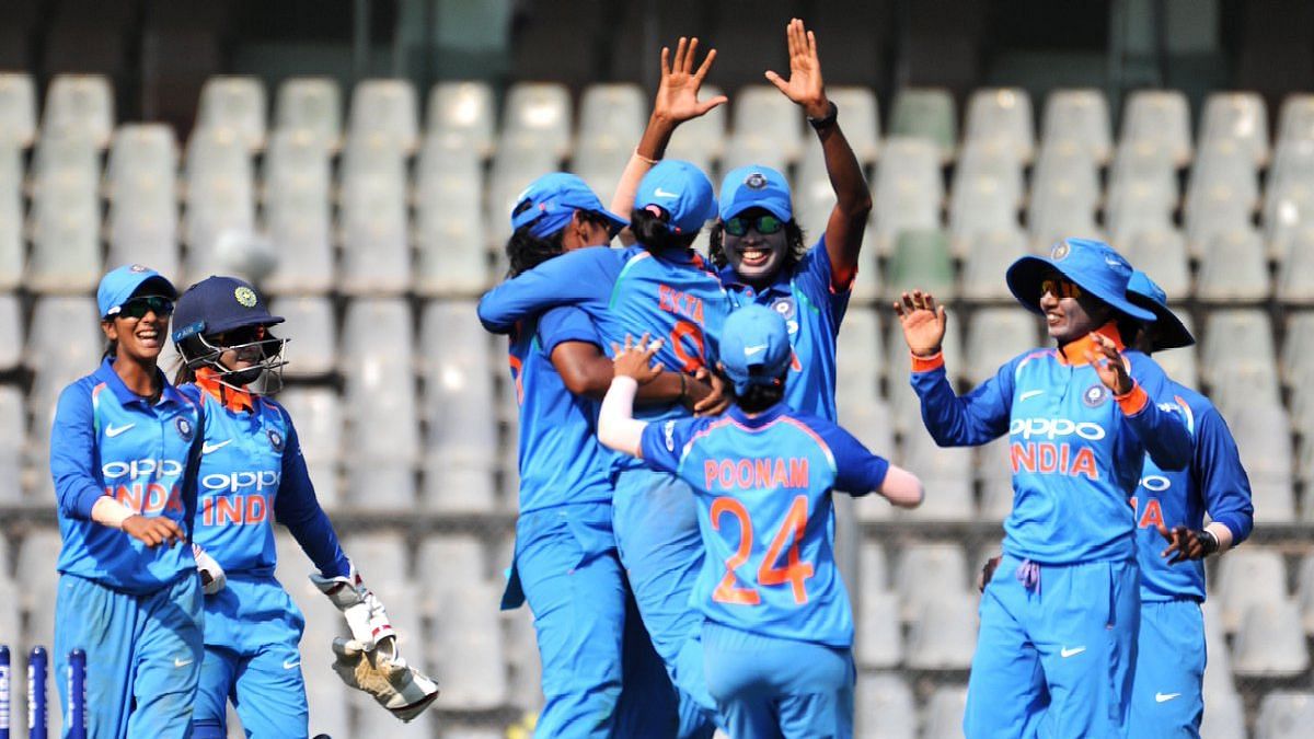 The Indian women’s team celebrate the fall of a wicket during their ODI series win against England at home.