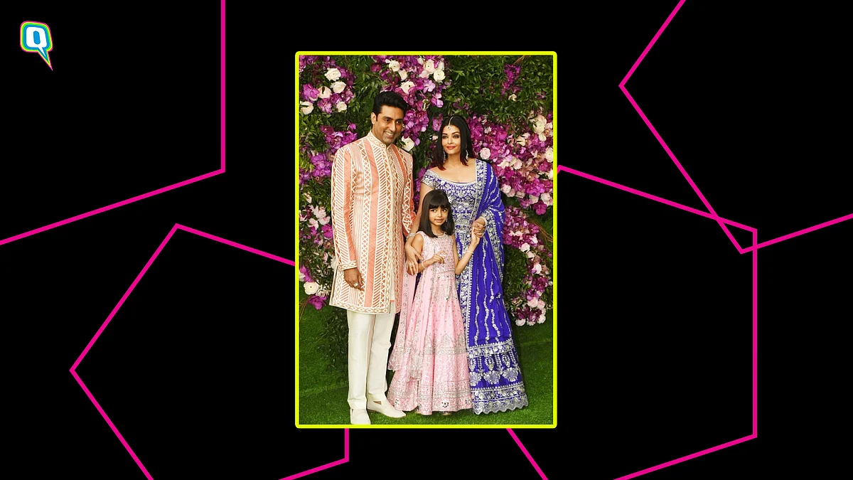 Abhishek Bachchan (L), Aishwarya Bachchan and Aaradhya Bachchan 