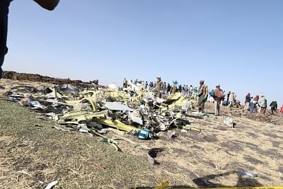 ADDIS ABABA, March 11, 2019 (Xinhua) -- Photo taken on March 11, 2019 shows the crash site of an Ethiopian Airlines plane near Bishoftu town, about 45 km from the capital Addis Ababa, Ethiopia. The Nairobi-bound Boeing 737-8 MAX crashed on Sunday, just minutes from takeoff from Addis Ababa Bole International Airport, killing all 157 people aboard. Earlier on Monday, Ethiopian Airlines announced its decision to suspend commercial operations of all Boeing 737-Max 8 aircraft. (Xinhua/Michael Teweld