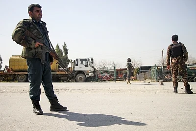NANGARHAR, March 6, 2019 (Xinhua) -- Afghan security force members stand guard near the site of an attack in Nangarhar province, Afghanistan, March 6, 2019. A total of 21 people including five attackers were killed and nine others injured as a blast followed by gun shots rocked Jalalabad city, the capital of eastern Nangarhar province on Wednesday, provincial government spokesman Attaullah Khogiani said. (Xinhua/Saifurahman Safi/IANS)