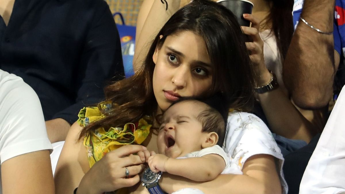 Samaira, who would be three-month-old soon, looked very comfortable while watching the match from her mother’s lap.