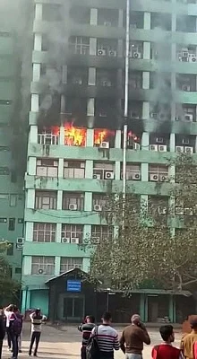 New Delhi: A fire that broke out on the fifth floor of the Pandit Deendayal Antyodaya Bhawan at the CGO complex, in New Delhi, on March 6, 2019. The blaze was first noticed at around 8.30 a.m., several fire tenders were rushed to the spot. (Photo: IANS)