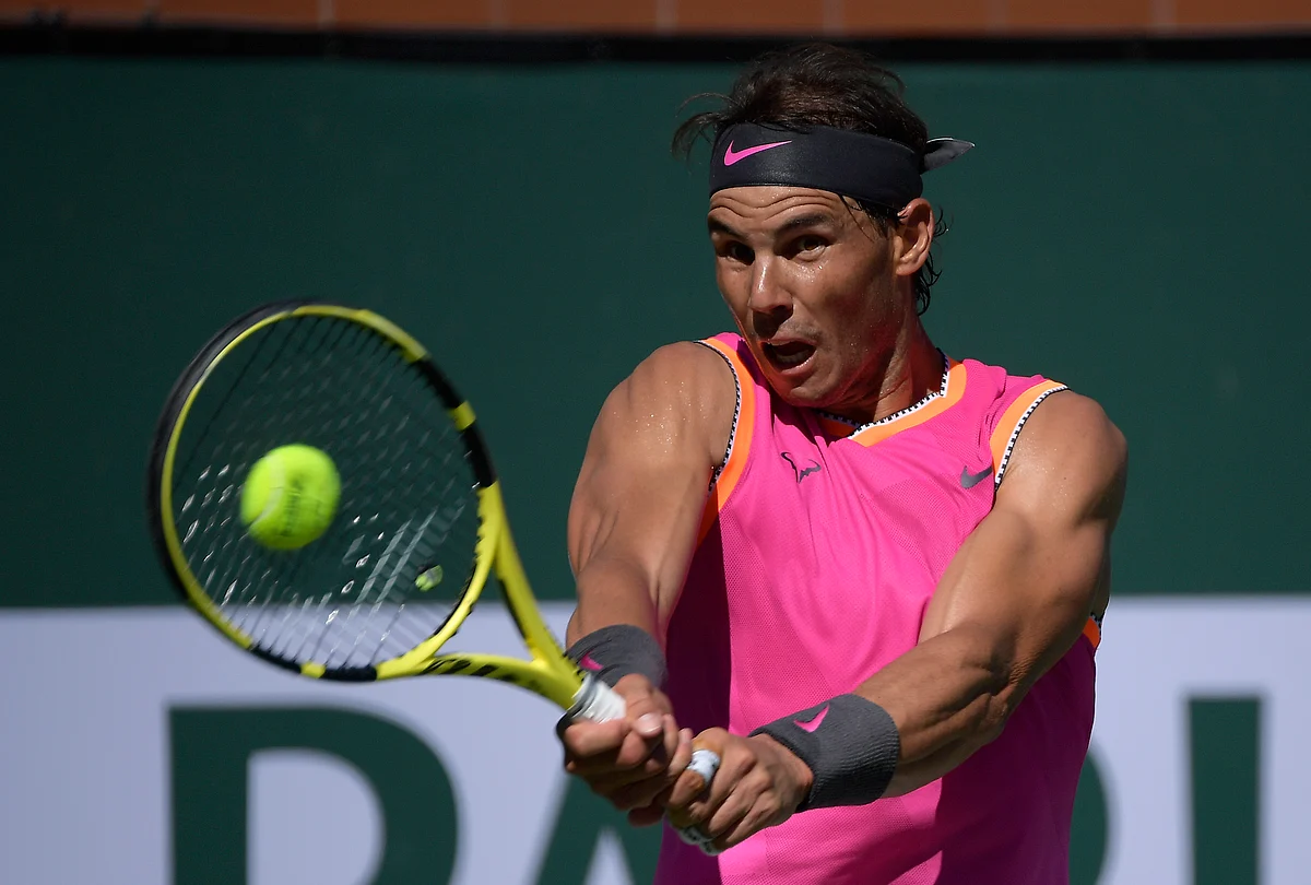 Rafael Nadal, of Spain, returns a shot to Diego Schwartzman at the BNP Paribas Open.