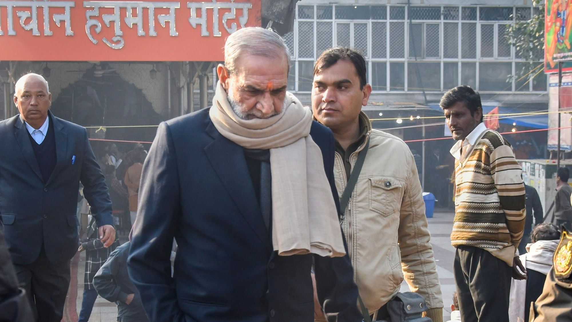 Congress leader Sajjan Kumar visits Hanuman temple at Cannaught Place, in New Delhi, Tuesday, 18 December. Delhi High Court verdict on Monday sentenced Kumar to spend the remainder of his life in jail in a 1984 anti-Sikh riots case.