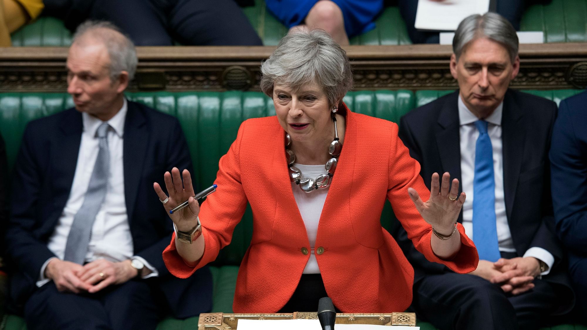 A file photo of British Prime Minister Theresa May speaking to lawmakers in parliament.
