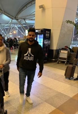 New Delhi: Cricketer Suresh Raina seen at Indira Gandhi International Airport in New Delhi, on Jan 24, 2019. (Photo: IANS)