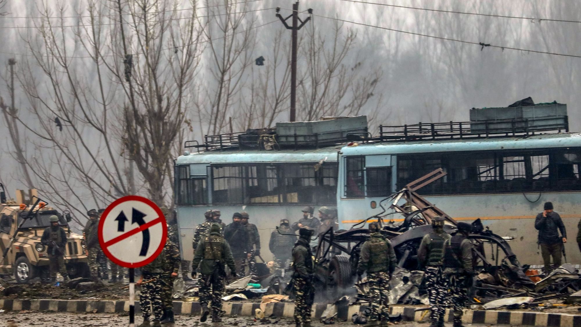 Security personnel carry out rescue and relief works at the site of the suicide bomb attack in Pulwama district of J&amp;K on 14 February.&nbsp;