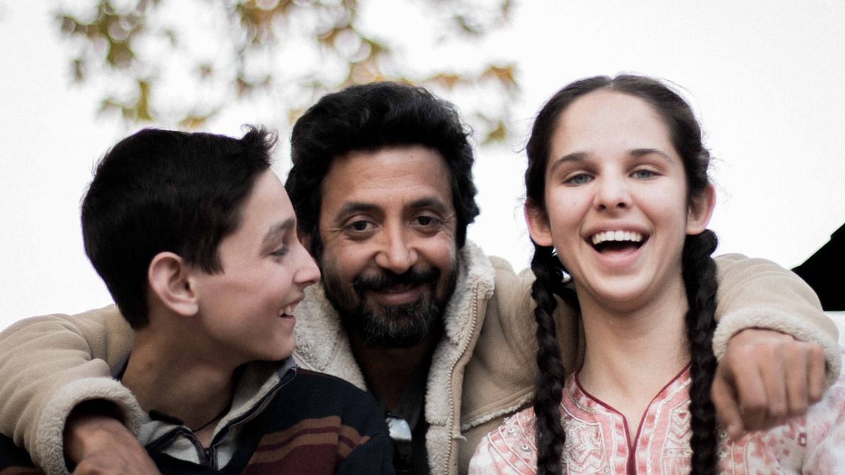 Ashvin Kumar with his actors from <i>No Fathers In Kashmir - </i>Shivam Raina and Zara Webb.