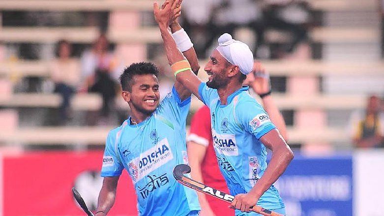 Mandeep Singh (right) scored thrice as India won 7-3 against Canada.