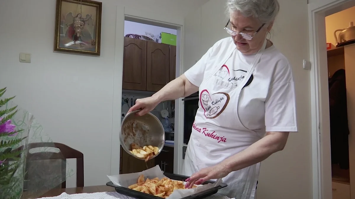 Granny Jela cooking. 