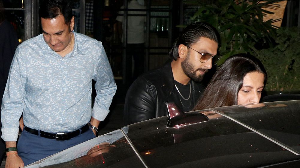Ranveer Singh with his parents at a restaurant in Mumbai.