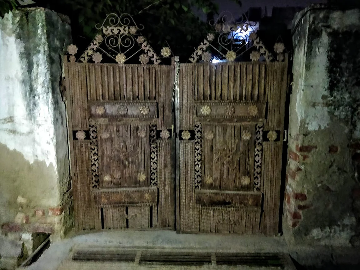 The gate to Mahesh Kumar’s home. The streets of Naya Gaon village wear a deserted look as the police has been regularly taking rounds to nab all the accused.