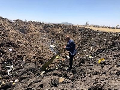 ADDIS ABABA, March 10, 2019 (Xinhua) -- A man checks the wreckage of the airplane of Ethiopian Airlines (ET) which crashed earlier near Bishoftu city, about 45 kms southeast of Addis Ababa, Ethiopia, March 10, 2019. All 149 passengers and eight crew members aboard ET 302, bound for Nairobi, Kenya, are confirmed killed, the Ethiopian Broadcasting Corporation (EBC) said. (Xinhua/Ethiopian Airlines/IANS)
