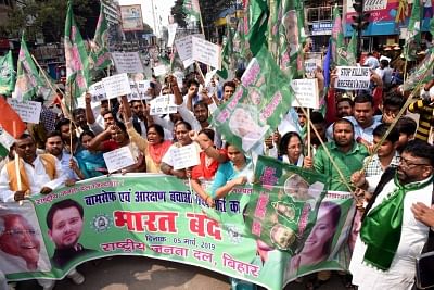 Patna: RJD workers participate in a march during "Bharat Bandh" in Patna on Feb 5, 2019. (Photo: IANS)