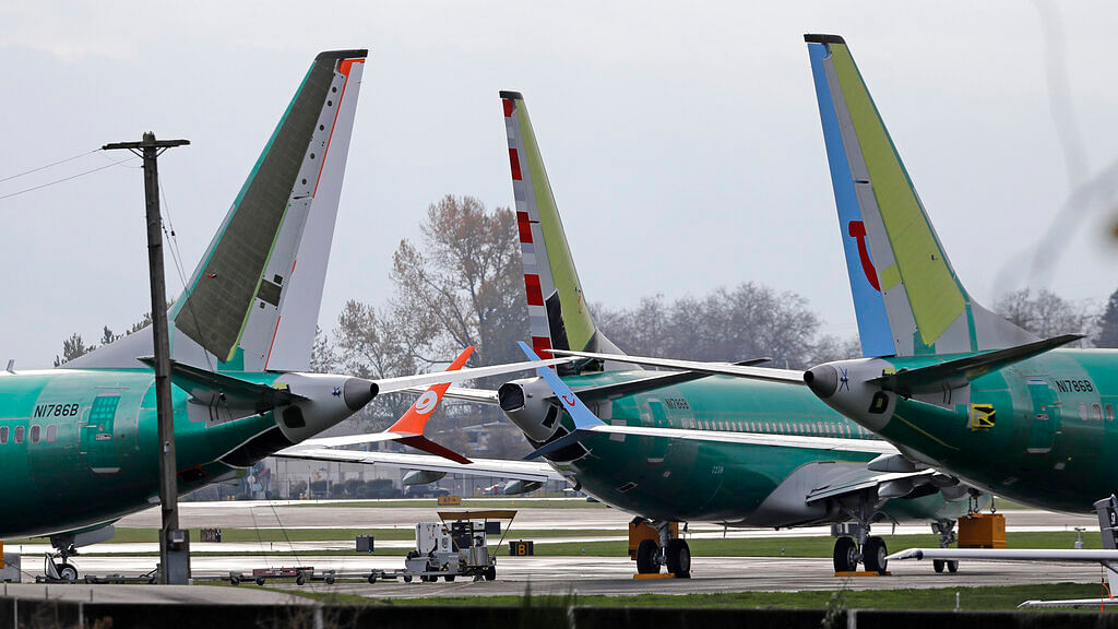 In this 14 November 2018 file photo, Boeing 737 MAX 8 planes are parked near the Boeing 737 assembly facility in Renton. 