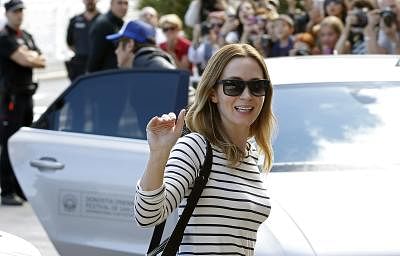 British actress Emily Blunt waves at the Hotel Maria Cristina in San Sebastian, northern Spain, 18 September 2015. Blunt will present her movie