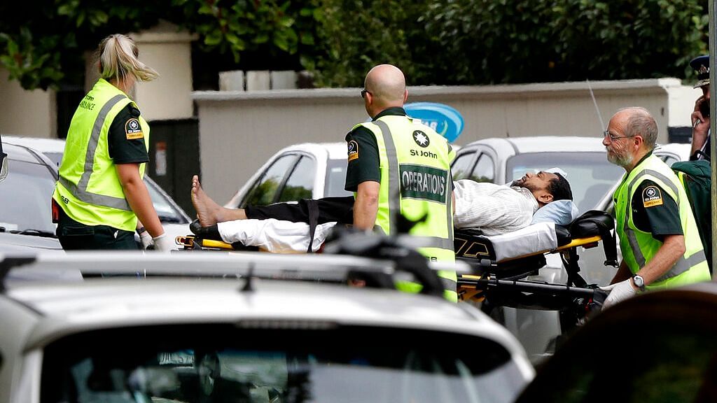 Ambulance staff take a man from outside a mosque in central Christchurch, New Zealand, Friday, March 15, 2019.&nbsp;