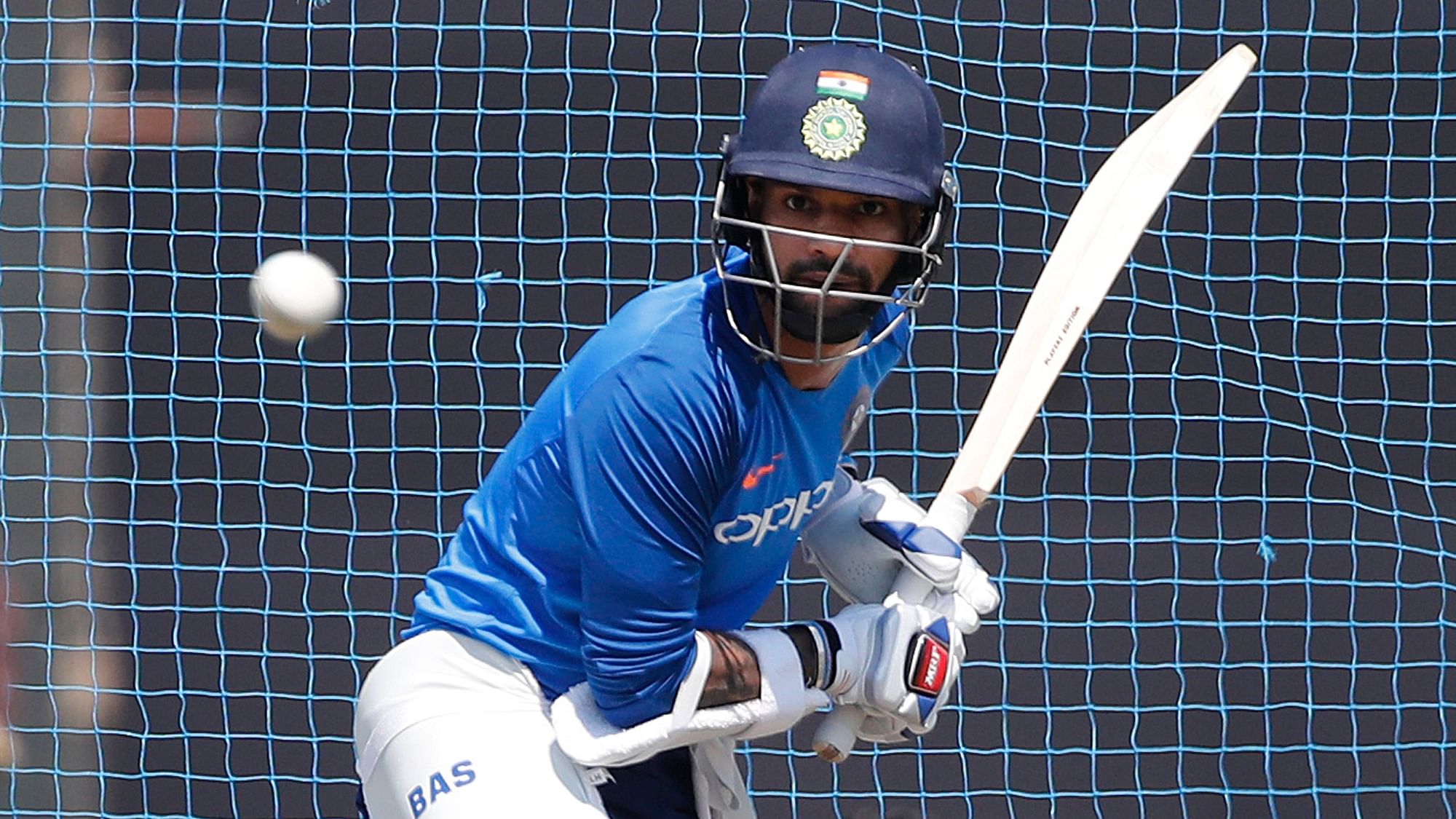 India’s Shikhar Dhawan bats during a training session ahead of their third one day international match against Australia in Ranchi on Thursday, 7 March.