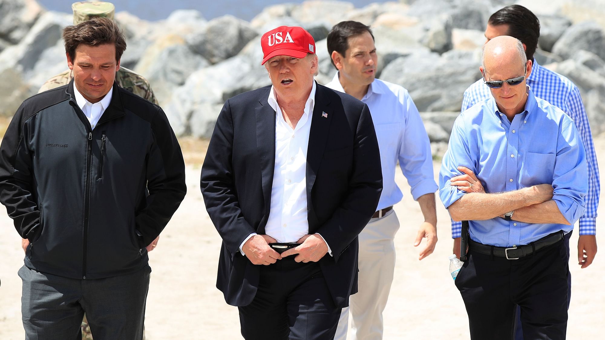 President Donald Trump with Florida Governor Ron DeSantis during a visit to Lake Okeechobee and Herbert Hoover Dike at Canal Point, Florida.