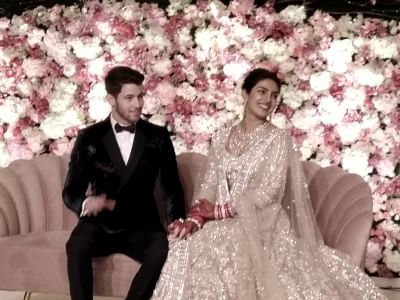 New Delhi: Actress Priyanka Chopra and her husband American singer Nick Jonas at their wedding reception in New Delhi on Dec 4, 2018. (Photo: IANS)