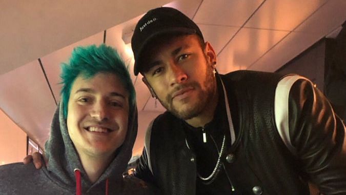 Neymar and Ninja share a box at the PSG vs Manchester United game.