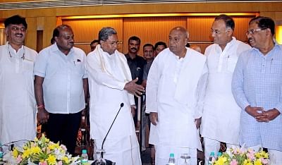 JD-S leaders - Karnataka Chief Minister H. D. Kumaraswamy and H. D. Deve Gowda with Congress leaders - Karnataka Deputy Chief Minister G. Parameshwara, state Cabinet Minister D. K. Shivakumar, Dinesh Gundu Rao and Siddaramaiah. (Photo: IANS)