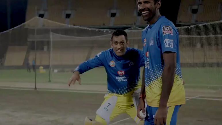 MS Dhoni entertains an intruder during a Chennai Super Kings practice session.
