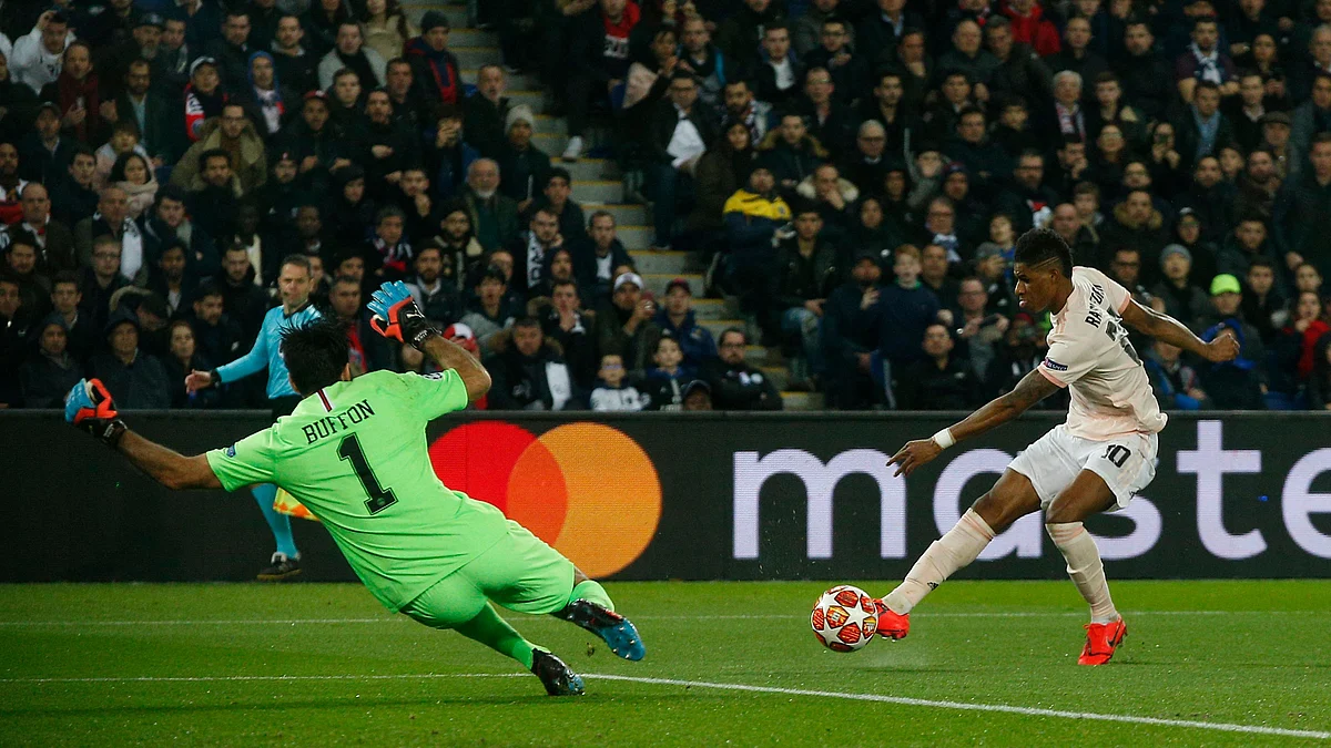 Manchester United’s Marcus Rashford attempts a shot at goal PSG goalkeeper Gianluigi Buffon during their Champions League round of 16, second leg,match in Paris on Wednesday, March. 6.