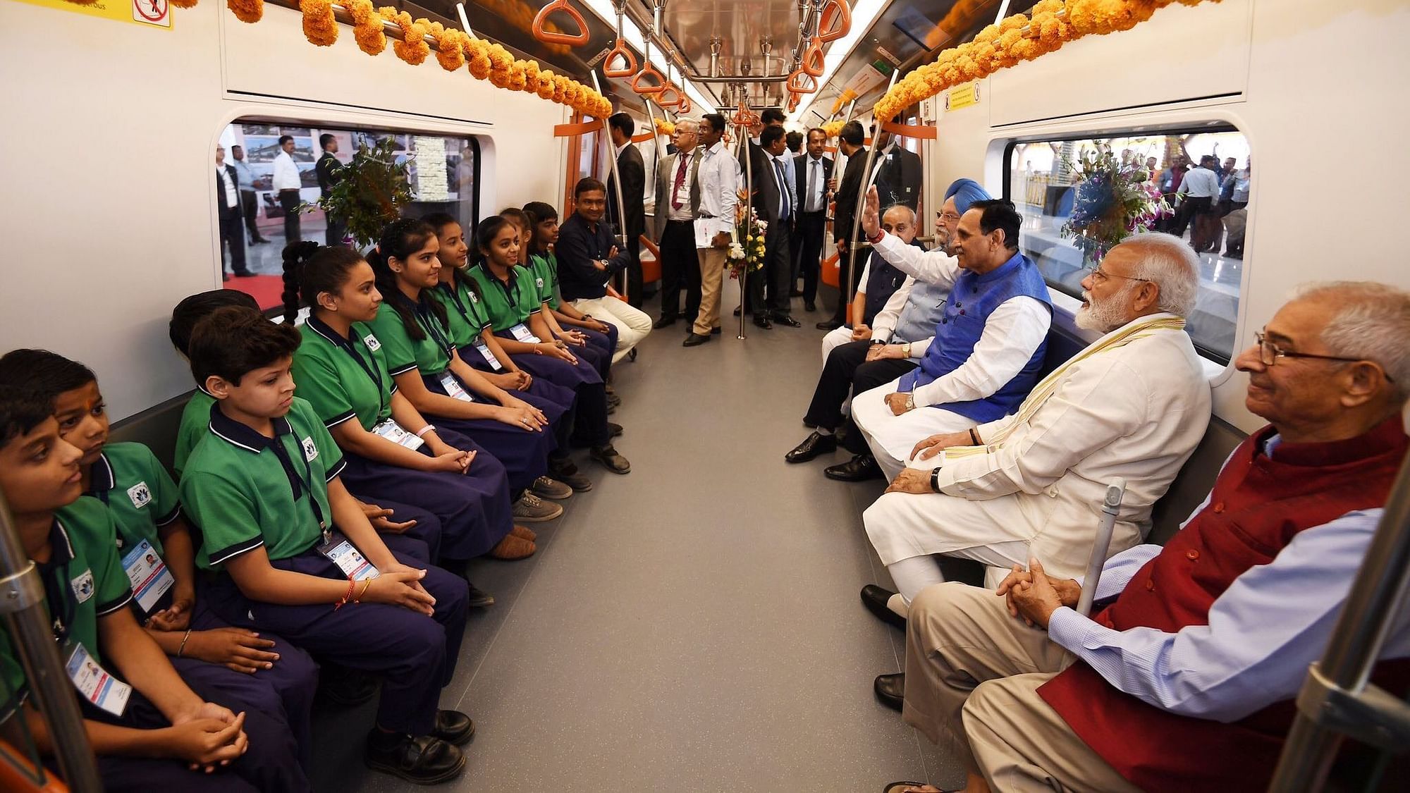 Prime Minister Narendra Modi travels in the newly inaugurated Ahmedabad Metro with Chief Minister Vijay Rupani and Gujarat Governor OP Kohli.