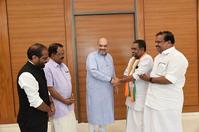 New Delhi: Former Kerala Public Service Commission (PSC) Chairman K. S. Radhakrishnan joins BJP in the presence of party chief Amit Shah at the party