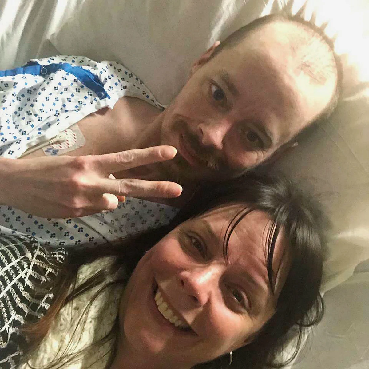 Bridgette Hoskie and her brother Jay Barrett pose for the photo inside an ICU at Yale New Haven Hospital in New Haven, Connecticut on 26 February, 2019. 