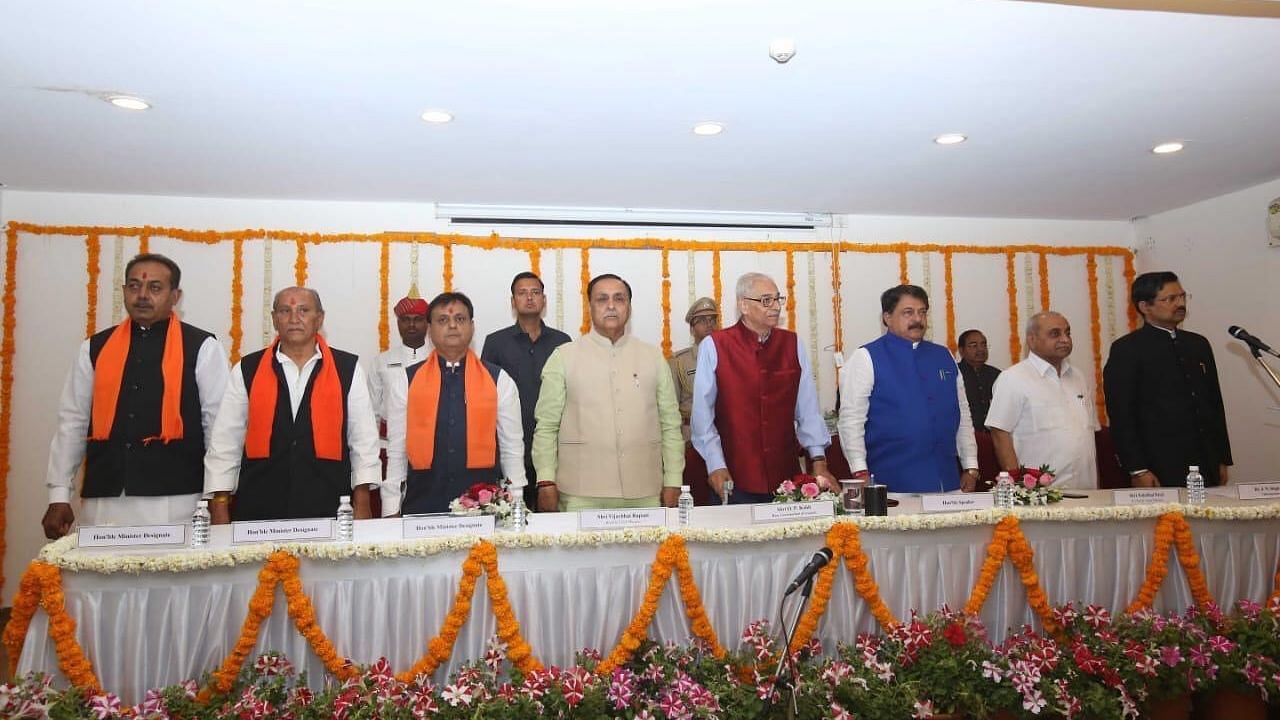 CM Vijay Rupani along with Governor OP Kohli and the new ministers inducted to the Gujarat Assembly – Jawahar Chavda, Yogesh Patel and Dharmendrasinh Jadeja.