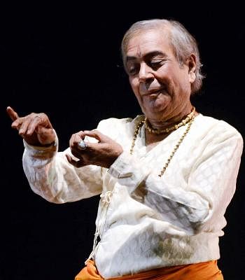 Dance maestro Pandit Birju Maharaj and his troupe performing during a programme in Patna on Dec. 7, 2013. (Photo: IANS)