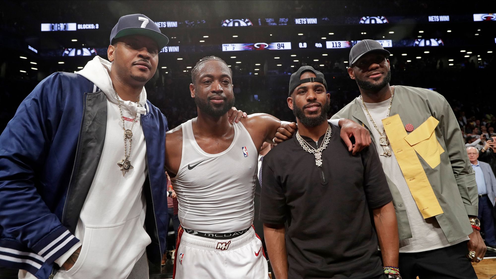 Carmelo Anthony, Miami Heat guard Dwyane Wade, Houston Rockets guard Chris Paul and Los Angeles Lakers forward LeBron James. from left, pose for a photographs on the court after Wade’s final NBA basketball game, against the Brooklyn Nets on Wednesday, April 10, 2019, in New York.