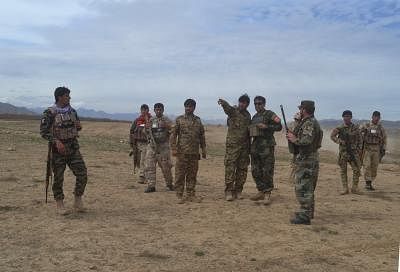 GHAZNI, April 11, 2019 (Xinhua) -- Afghan security force members take part in a military operation in Ghazni province, eastern Afghanistan, April 10, 2019. Six militants and four police personnel have been killed as a clash erupted between government forces and the Taliban outfit in Waghaz district of Afghanistan