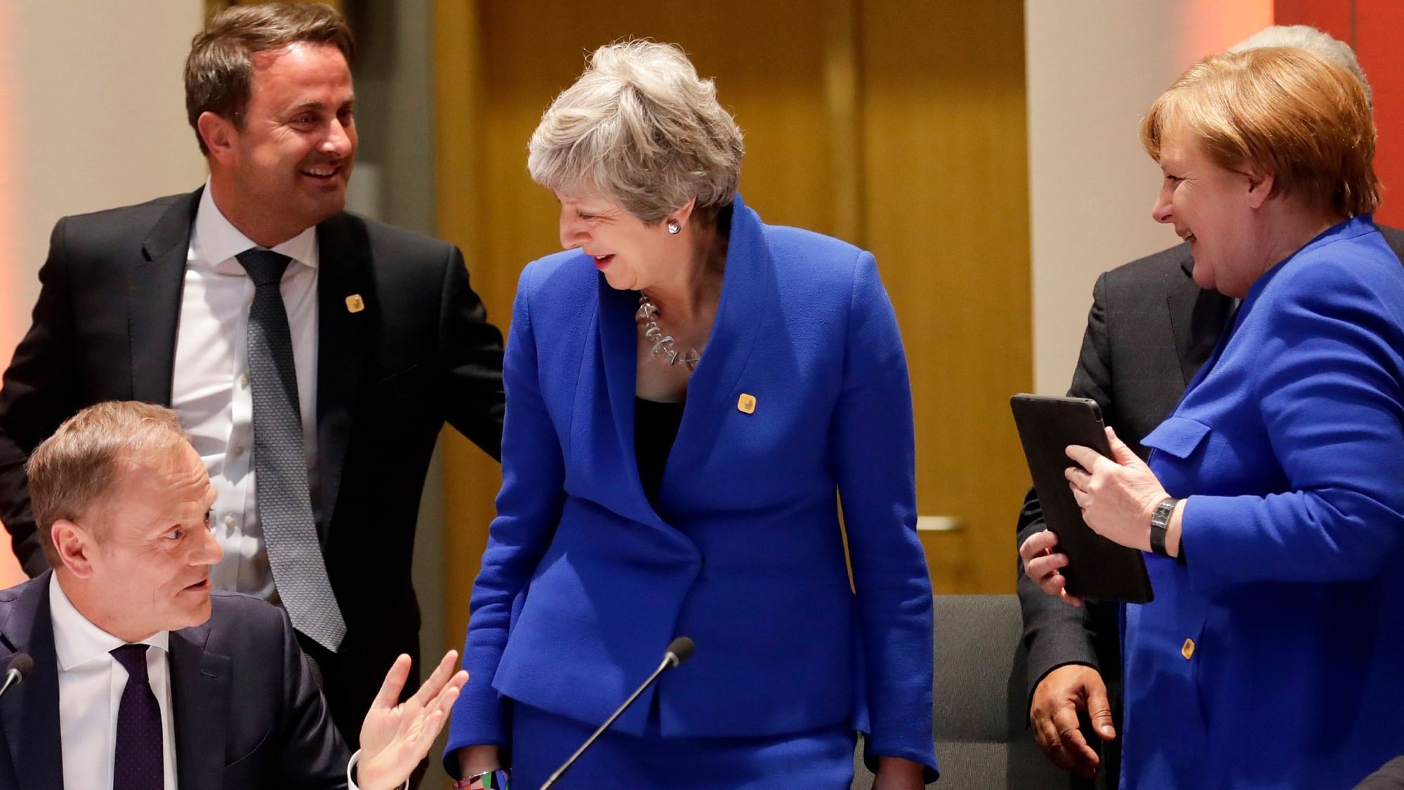 European Council President Donald Tusk, left, speaks with British Prime Minister Theresa May, centre, German Chancellor Angela Merkel, right, and Luxembourg’s Prime Minister Xavier Bettel, second left on Wednesday, 10 April 2019.&nbsp;