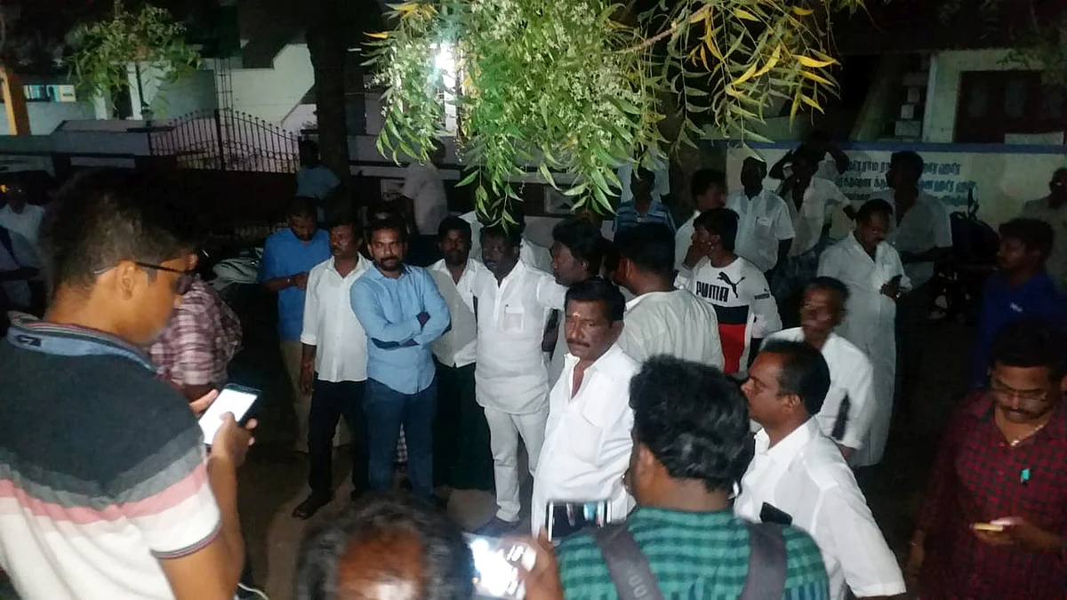 DMK supporters stands in front of DMK leader Kanimozhi’s house were income tax department raided the house of DMK leader Kanimozhi in Tamil Nadu’s in Tuticorin on Tuesday, 16 April. 