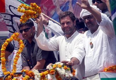 Congress vice president Rahul Gandhi campaigning with party candidate Ajay Rai in Varanasi on May 10, 2014. (Photo: IANS)