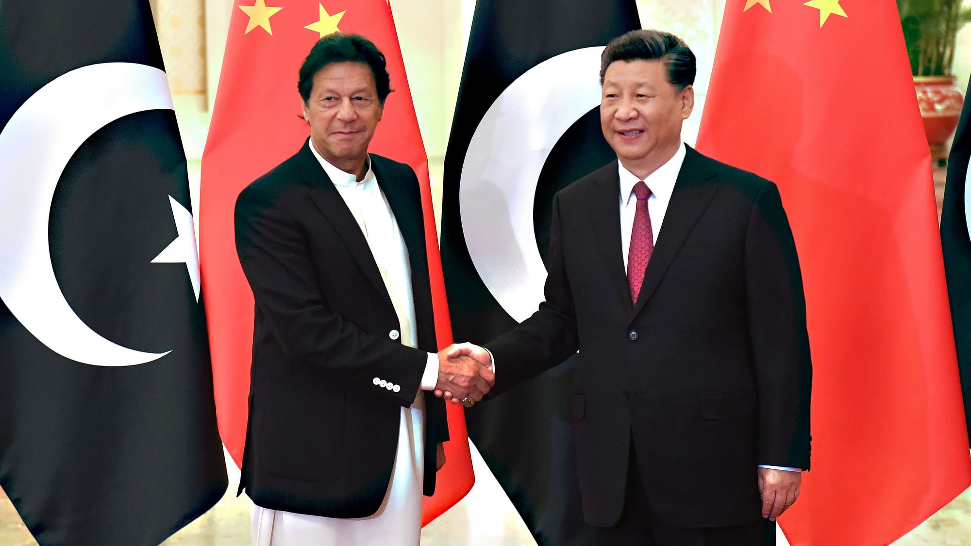 China’s President Xi Jinping, right, shakes hands with Pakistan’s Prime Minister Imran Khan before a meeting at the Great Hall of the People in Beijing Sunday, April 28, 2019.&nbsp;