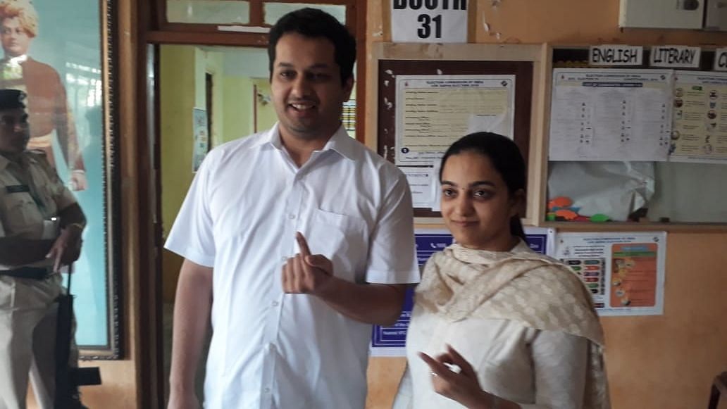 Utpal Parrikar, son of late Goa CM Manohar Parrikar, shows his inked finger after casting his vote in the third phase of Lok Sabha elections in North Goa’s Mapusa, on 23 April.