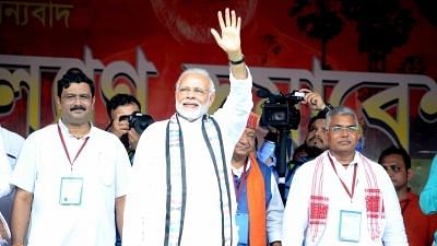 Midnapore: Prime Minister Narendra Modi waves at farmers during “Kisan Kalyan” rally, in West Bengal. Image used for representation.